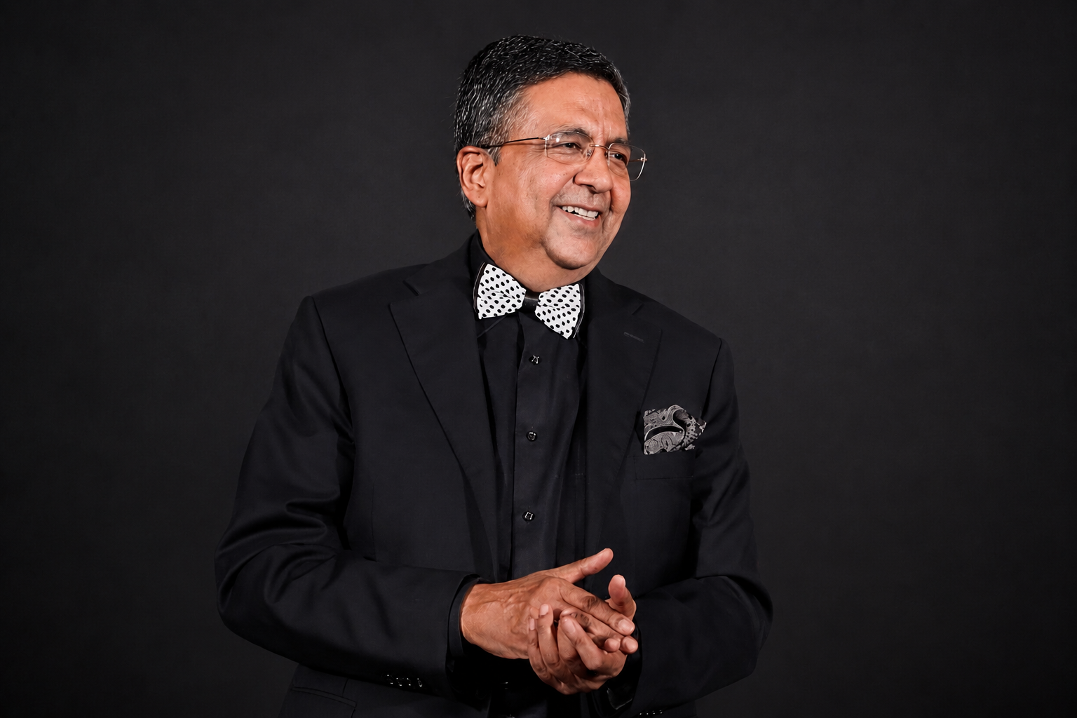 Abhay Gupta portrait against a black background